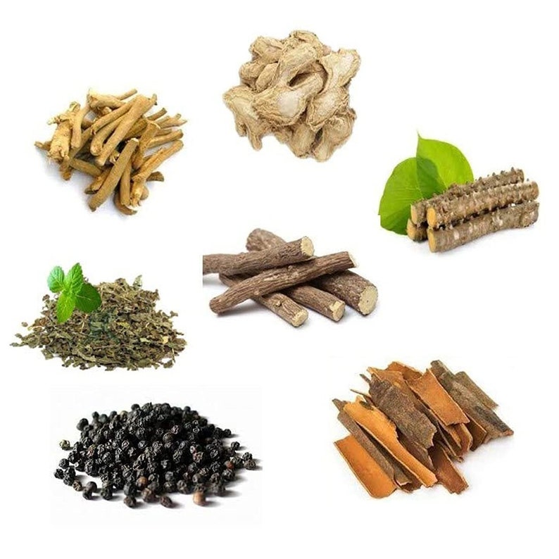 May include: A collection of dried herbs and spices, including ginger, liquorice root, cinnamon sticks, black peppercorns, and dried green tea leaves.