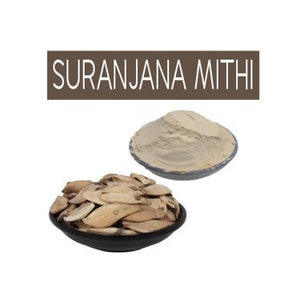 May include: A bowl of dried, light brown, irregularly shaped pieces of Suranjana Mithi root. A separate bowl contains a light brown powder, also Suranjana Mithi.