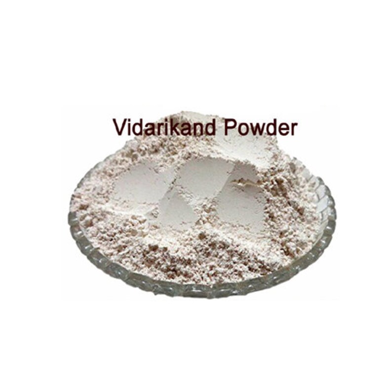 May include: A white powder, labelled Vidarikand Powder, is presented in a clear glass bowl. The powder is finely ground and has a light, airy texture.