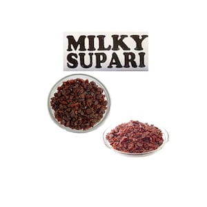 May include: Two bowls filled with brown, dried, chopped supari, a type of areca nut, with the text "MILKY SUPARI" on a white label.