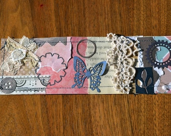 Rolo de trecho de papel feito à mão, coisas efêmeras, enfeite, diário de lixo.