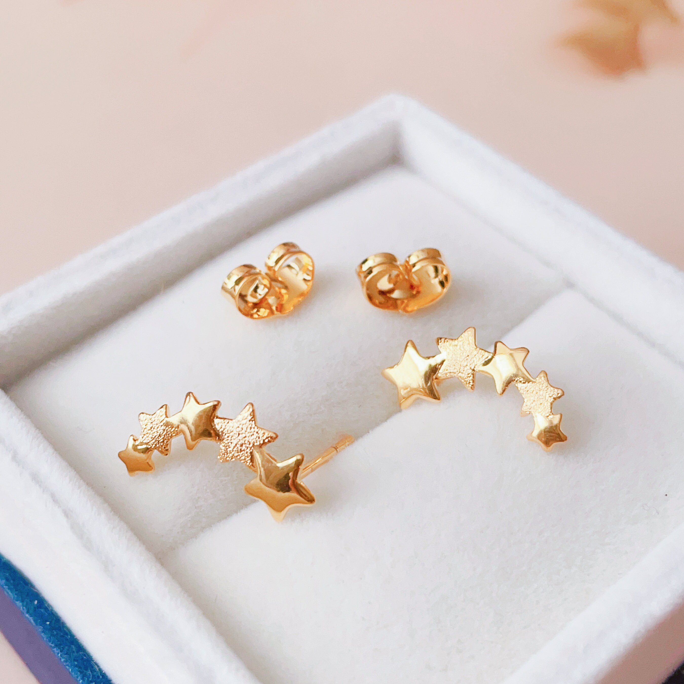 Star design shop gold earrings