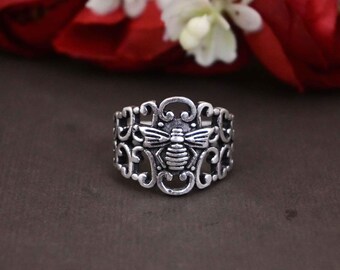 Zilveren ring met honingraatmotief en bijen - Sieraden geïnspireerd op de natuur