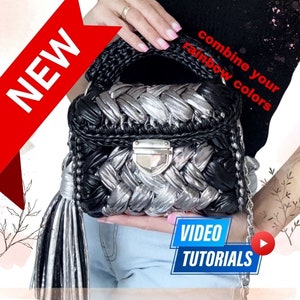 May include: A black and silver woven handbag with a silver tassel and chain strap. The bag has a silver clasp and the text "combine your rainbow colors" is written on the side. The text "NEW" is in red and the text "VIDEO TUTORIALS" is in blue.