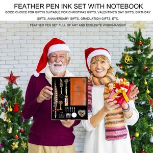May include: A gift set featuring a feather pen, ink, and a leather-bound notebook. The set is displayed in a box with a red and gold design. The box is being held by two people wearing Santa hats.