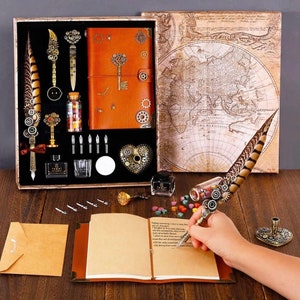 May include: A vintage-style calligraphy set in a wooden box with a leather-bound journal, inkwell, feather pen, and various nibs. The box also includes a wax seal and a decorative heart-shaped charm.