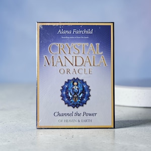 May include: A boxed deck of the "Crystal Mandala Oracle" by Alana Fairchild. The box is blue and gold, with the title in large gold letters. The bottom of the box reads "Channel the Power of Heaven & Earth".