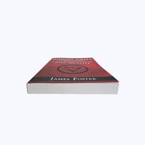 May include: A book titled "Hidden Unity" by James Foster. The cover is a deep red with a geometric design and the title in white. The book's spine is white.
