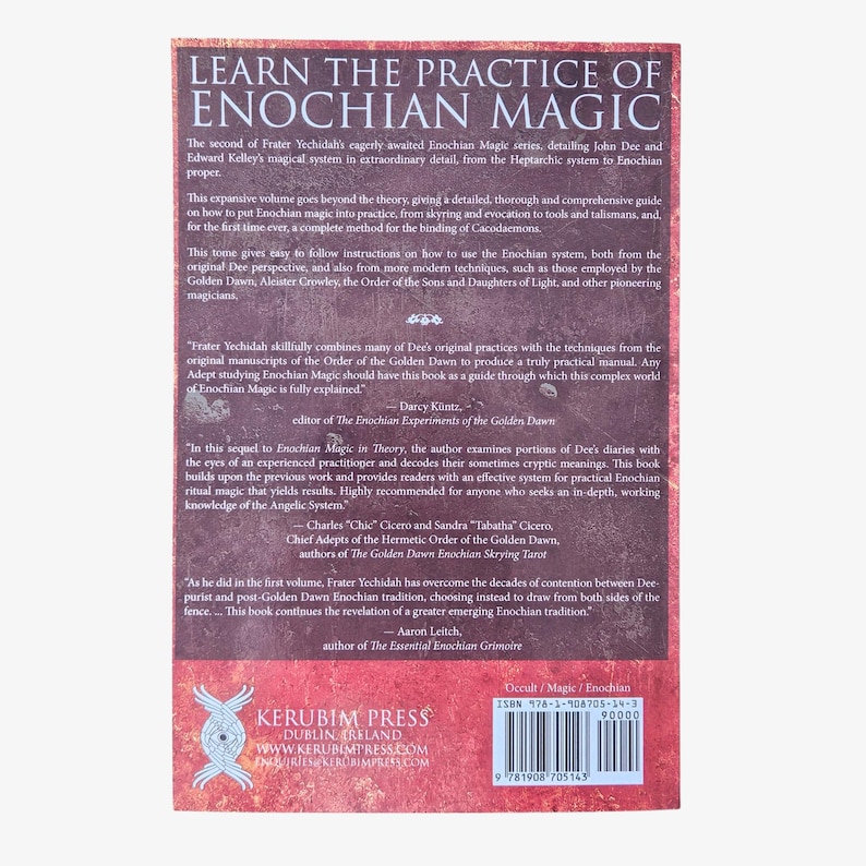 May include: A book titled "Learn the Practice of Enochian Magic" with text and a Kerubim Press logo. The cover is a reddish-brown color with white text. The book details the magical system of John Dee and Edward Kelley.