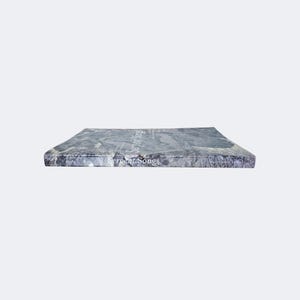 May include: A rectangular book titled Serpent Songs with a marbled gray and white cover pattern. The title is printed in white text on the front cover and the spine. The book is positioned horizontally, showing the front cover and the spine.