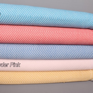 May include: Five different colored woven throws with fringe edges. The colors are turquoise, vermilion, blue, light powder pink, and mustard.
