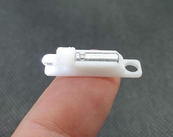 LIXY NANO Najmniejsza na świecie latarka Micro Nano do breloczki w kolorze bia?ym