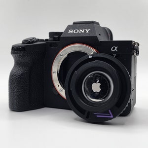 Afsluitbare bodydop met verborgen AirTag- en tegelvak voor Sony camera's met e-bevestiging
