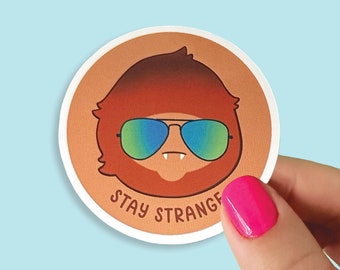 STAY STRANGE Yowie Bigfoot with Sunglasses Glossy Sticker | Cute Cryptid Paranormal Circle Sticker | Waterproof Weatherproof Die Cut Vinyl