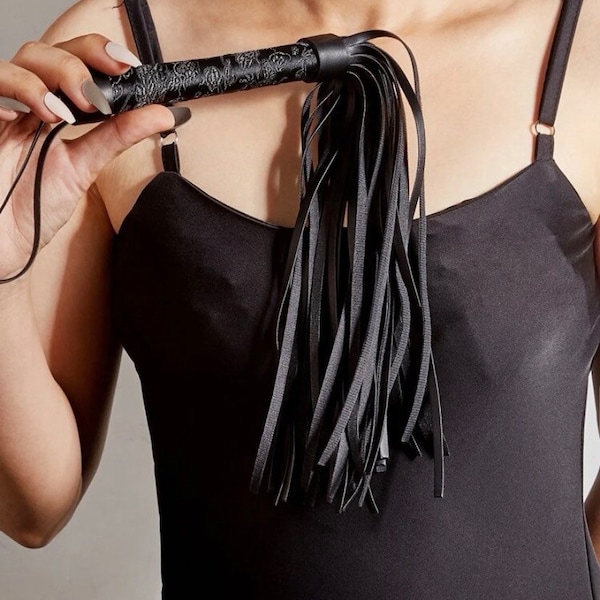 Black faux leather flogger whip - embroidered handle with leather tassels