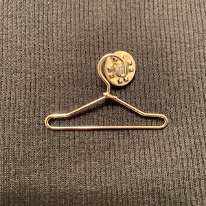 Statement pins deals