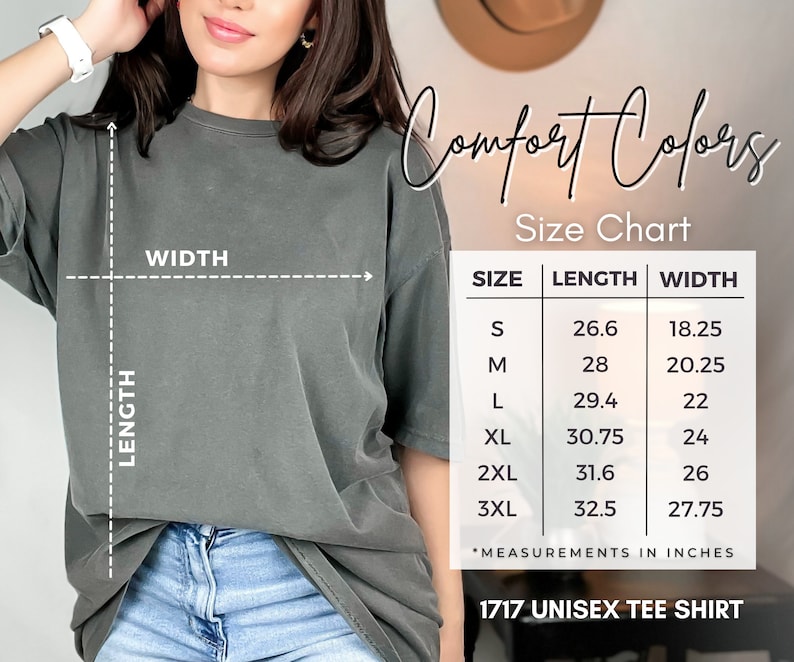 K&ouml;nnte beinhalten: Graues Unisex-T-Shirt mit Gr&ouml;&szlig;entabelle. Die Tabelle zeigt die Ma&szlig;e in Zoll f&uuml;r die Gr&ouml;&szlig;en S bis 3XL. Die L&auml;nge des Shirts reicht von 67,6 cm bis 82,6 cm, und die Breite von 46,3 cm bis 70,5 cm. Der Text "Comfort Colors" ist ebenfalls sichtbar.