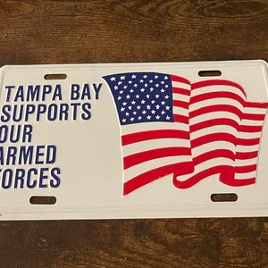 Tampa Bay Florida Supports Our Armed Forces Booster License Plate USA Flag Military Support Veteran