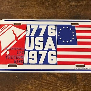 1776 VS 1976 Bicentennial Booster-kentekenplaat Liberty Bell Let Freedom Ring