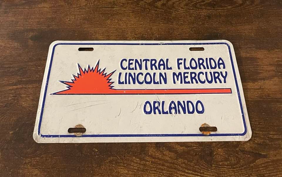 Central Florida Lincoln Mercury Dealership Booster License Plate
