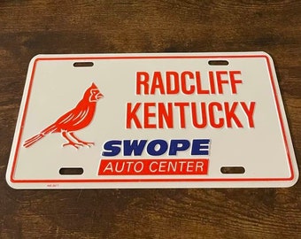 Radcliff Kentucky Swope Auto Center Booster Dealership License Plate Cardinal Cardinals Vintage Dealer