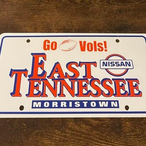 East Tennessee Nissan Dealership Booster License Plate Go Vols University of Tennessee Morristown PLASTIC