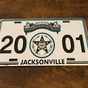 2001 Fraternal Order of Police Booster License Plate Jacksonville Florida