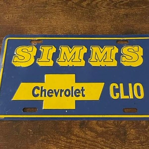 Simms Chevrolet Dealership Booster License Plate Clio Michigan Dealer