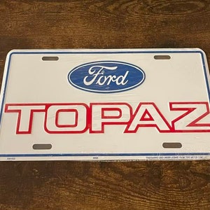 Vintage Ford Topaz Booster License Place Very Rare Type Ford Motor Company Tempo