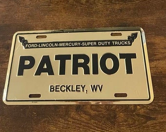 Patriot Ford Lincoln Mercury Dealership Booster License Plate Beckley West Virginia Super Duty trucks F150 F250 F350 F450 F550 F650