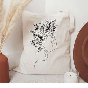 Borsa tote minimalista Frida, camicia da disegno Line Art, borsa minimalista, borsa con fiori di linea botanica, regali femministi, borsa del mercato contadino carino