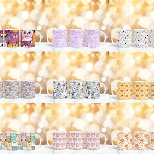 May include: Set of 12 white ceramic mugs with various cat-themed designs. The mugs feature different colored cats with various expressions and patterns. The mugs are arranged in three rows of four.