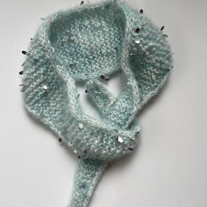 Cute blue handknit mini-scarf embellished with sequins
