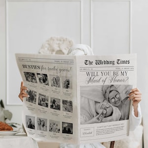 May include: A mock newspaper with a black and white photo of two women and the text "BESTIES for twelve years!" and "WILL YOU BE MY Maid of Honor?"  The newspaper is titled "The Wedding Times".