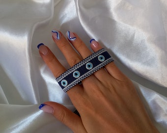 Greek eye woven bracelet