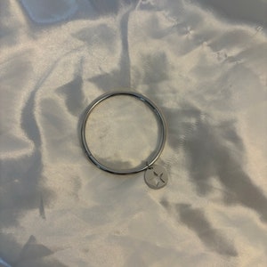 Silver hollowed out star bangle image 1