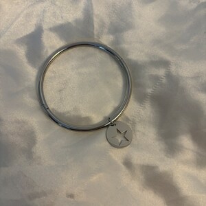 Silver hollowed out star bangle image 2