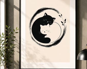 May include: Black framed art print featuring a black and white cat illustration. The cats are intertwined within a black circular brushstroke design, with a sprig of leaves. The background is a light beige color.