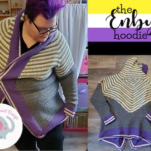 May include: A grey and purple striped crochet hoodie with a hood. The hoodie has a white stripe on the edge of the hood and sleeves. The text "the Enby hoodie" is written in black on a yellow, white and purple background.