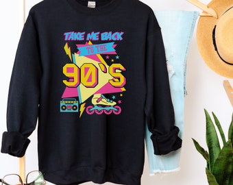 May include: Black sweatshirt with a graphic design featuring the text "Take Me Back To The 90's" in a colorful retro style. The design includes a boombox, roller skates, and stars.