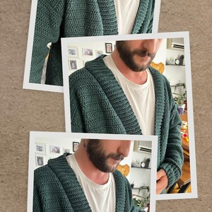 May include: A dark green hooded cardigan with a knitted texture. The cardigan is open in the front and has a relaxed fit.