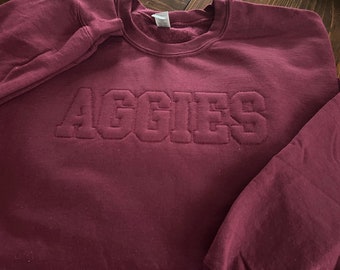 College embroidered sweatshirt- Aggies