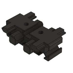 May include: Two black, interlocking plastic components. Each piece has a rectangular top with a circular hole and a series of protrusions and recesses. The design suggests a mechanical or structural purpose.