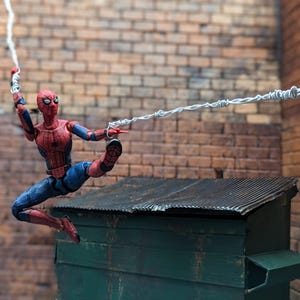 Accessoire effet toile enroulée Spider-Man à l&#39;échelle 1:12