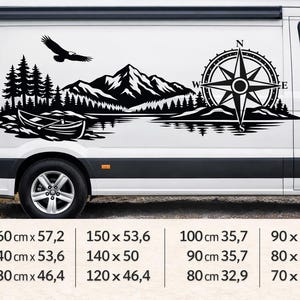 May include: A black vinyl decal on a white van featuring a mountain range, pine trees, a flying eagle, a canoe on water, and a compass rose. Below the van, a chart lists dimensions in centimeters ranging from 160x57.2 to 70x25 inches.