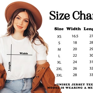 May include: A white unisex jersey tee with a size chart. The chart lists sizes XS to 3XL, with corresponding width and length measurements in inches. The model is wearing a medium.