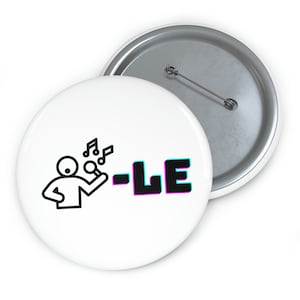 May include: White button featuring a black line drawing of a person singing into a microphone with musical notes above their head. The text " -LE" is in black with a pink and blue outline.