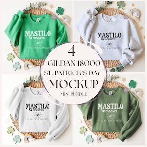 Puede incluir: Una maqueta con cuatro sudaderas Gildan 18000 en verde, gris, blanco y verde oliva. Cada sudadera muestra el logotipo "MASTILO" y el texto "YOUR DESIGN HERE". La imagen incluye decoraciones temáticas del Día de San Patricio.