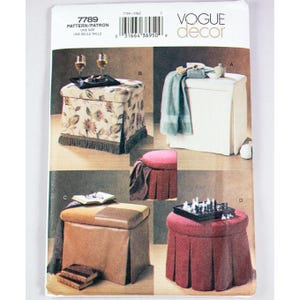 May include: A sewing pattern for four different styles of ottomans. The ottomans are shown in various fabrics and colors, including floral, red, brown, and white. The pattern is from Vogue Decor and is for one size.