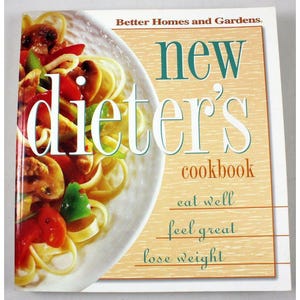 May include: A cookbook titled "new dieter's cookbook" by Better Homes and Gardens. The cover features a plate of pasta with vegetables. The text on the cover includes "eat well, feel great, lose weight."